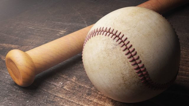 Close up of baseball and bat on aged wooden table. 3D Rendering
